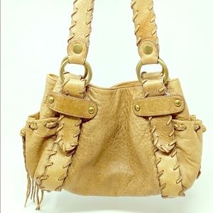 Kooba-handcrafted leather stitched purse